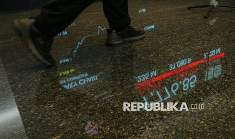 IHSG Dibuka Menguat ke 7.074, Pasar Tunggu Keputusan The Fed dan BI